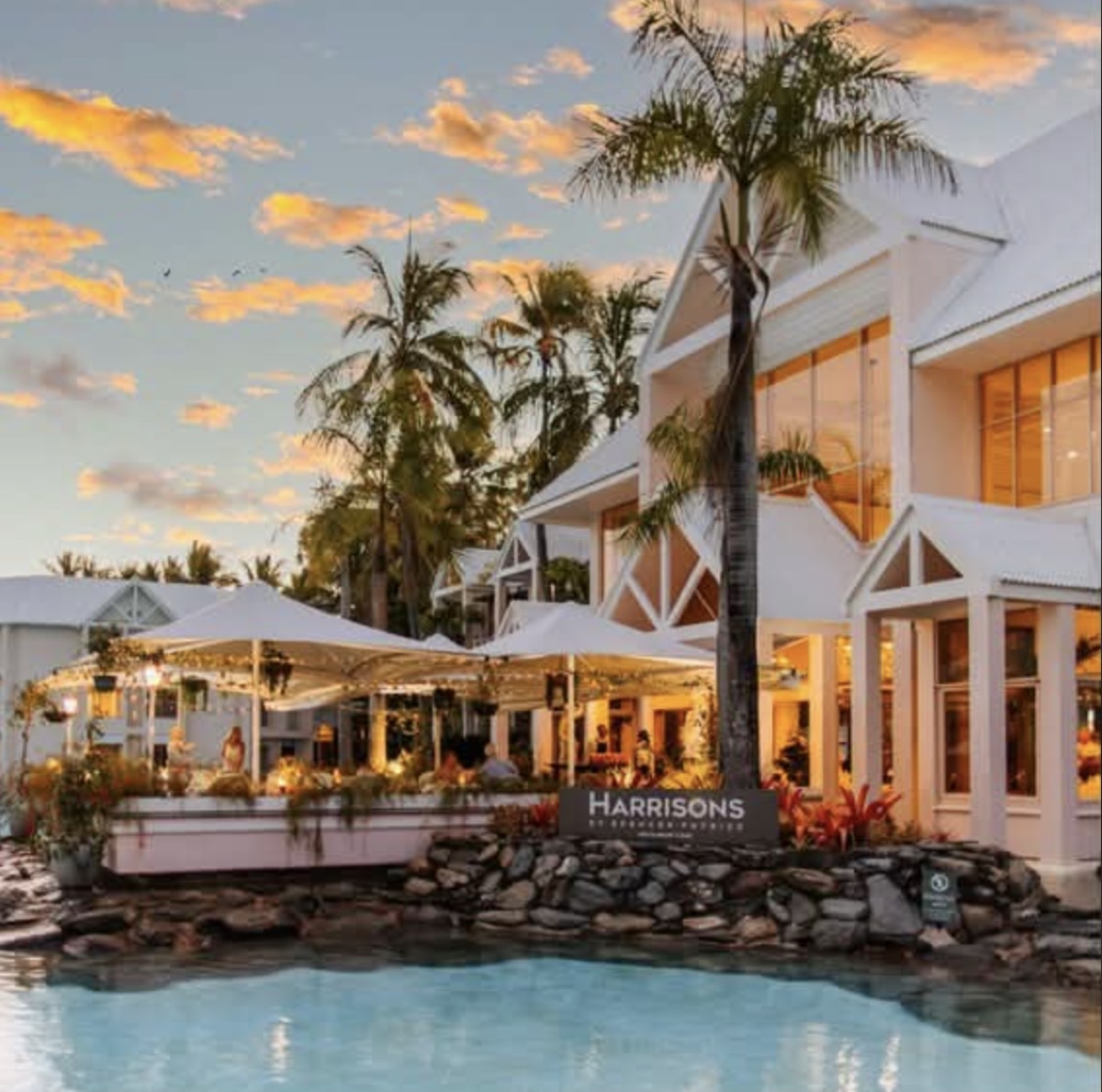 Harrisons restaurant beside the lagoon at dusk